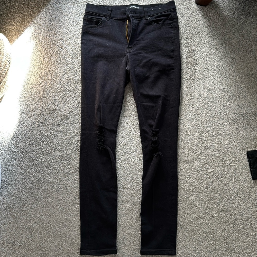 Express black high rise ripped jeans. Size 8R